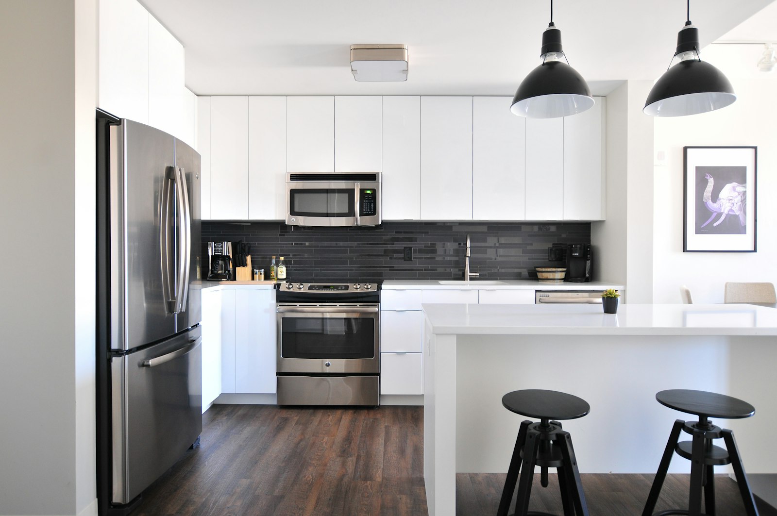 A bright, tidy kitchen with an organized countertop and clear prep space